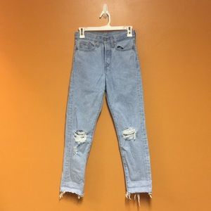 Levi’s distressed light wash jeans